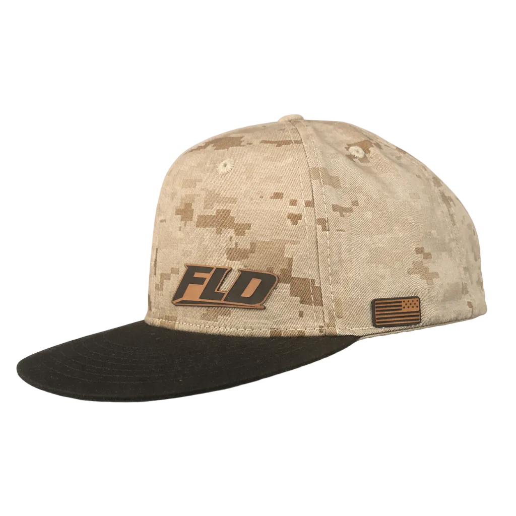 Camouflage baseball cap with 'FLD' logo on a white background