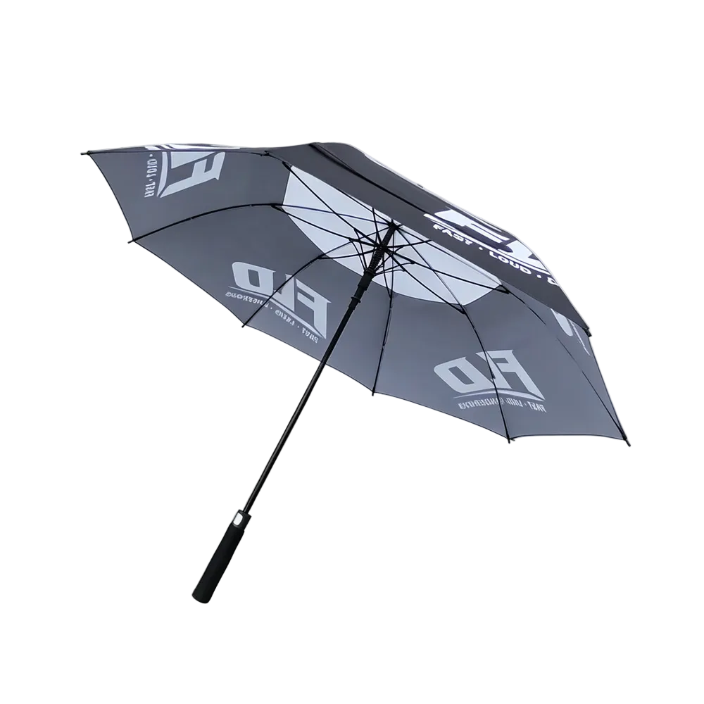 A black and white golf umbrella with a black handle, shown open on a light gray studio background. The canopy features a white geometric pattern and white text reading 'FD' and 'FAST DROPOVER'.