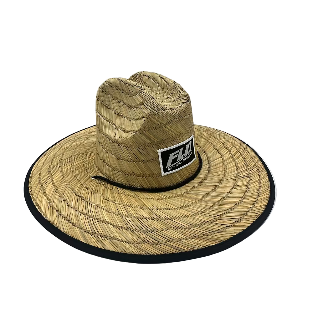 FLD straw sun hat with wide brim and front logo patch shown at a 45-degree angle on a white background.
