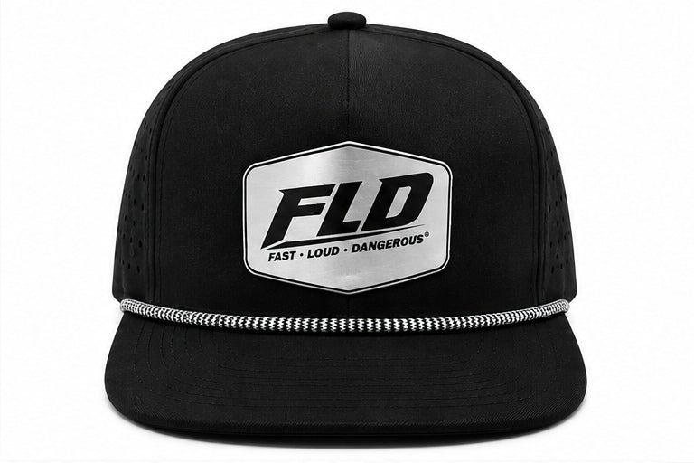 A black snapback cap with a silver and black FLD logo patch on the front, a silver chain detail across the brim, and perforated side panels, shown on a white background.